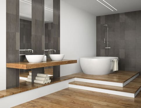 Salle de bains plan de travail en bois avec deux vasques et une baignoire